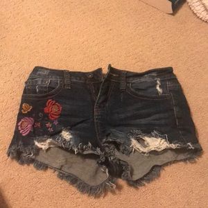 denim shorts with flowers embroidered